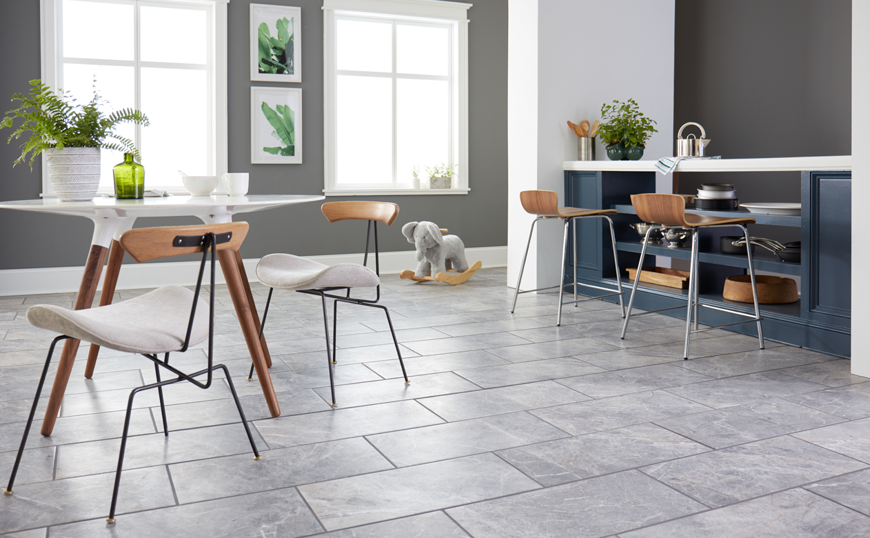 Slate tile floor with  casual counter seating. 